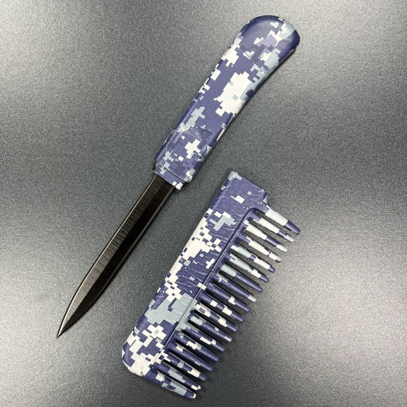 comb with knife inside